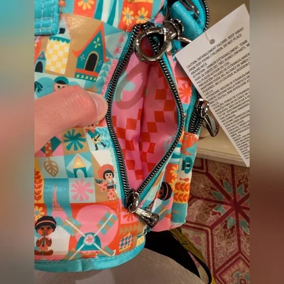 NEW 2024 Disney Parks Lug Huggie Bag Water Bottle Holder It’s A Small World - Picture 6 of 7